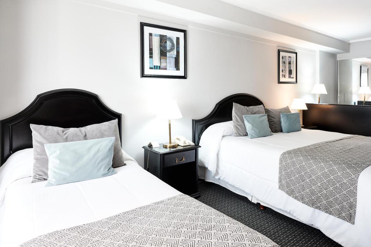 Plaza Real Suites Hotel ロサリオ エクステリア 写真