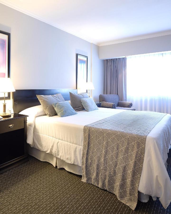 Plaza Real Suites Hotel ロサリオ エクステリア 写真