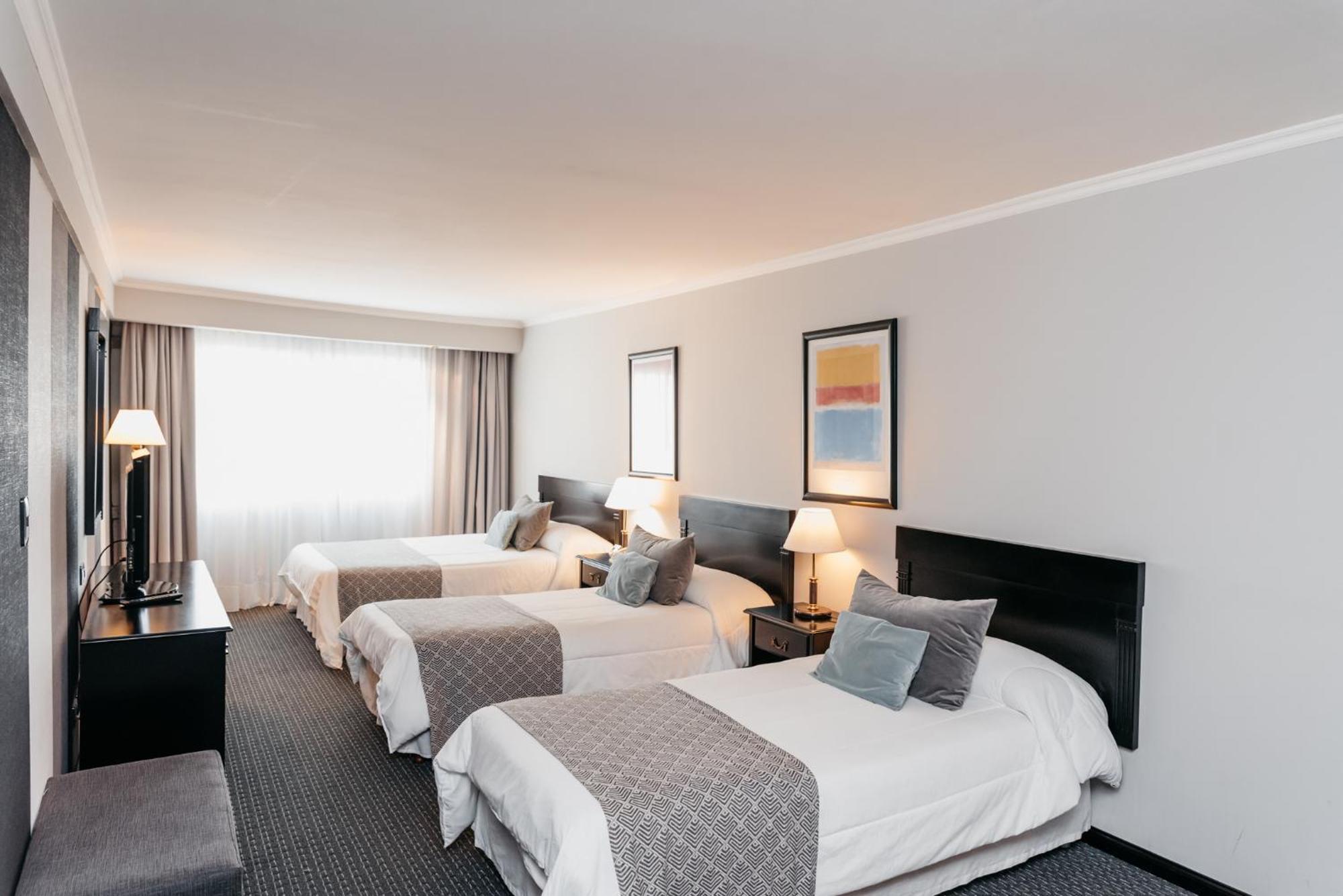Plaza Real Suites Hotel ロサリオ エクステリア 写真