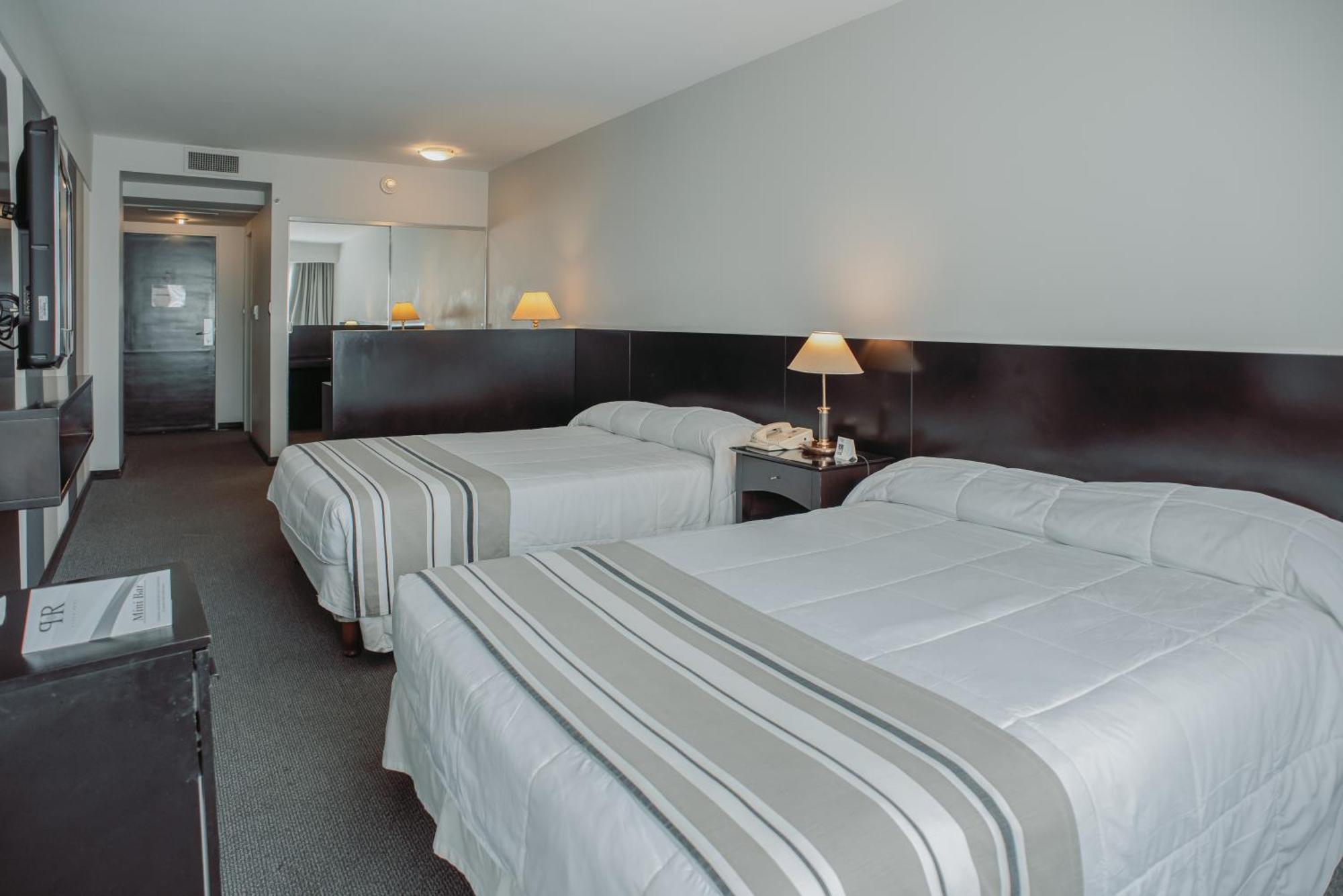 Plaza Real Suites Hotel ロサリオ エクステリア 写真
