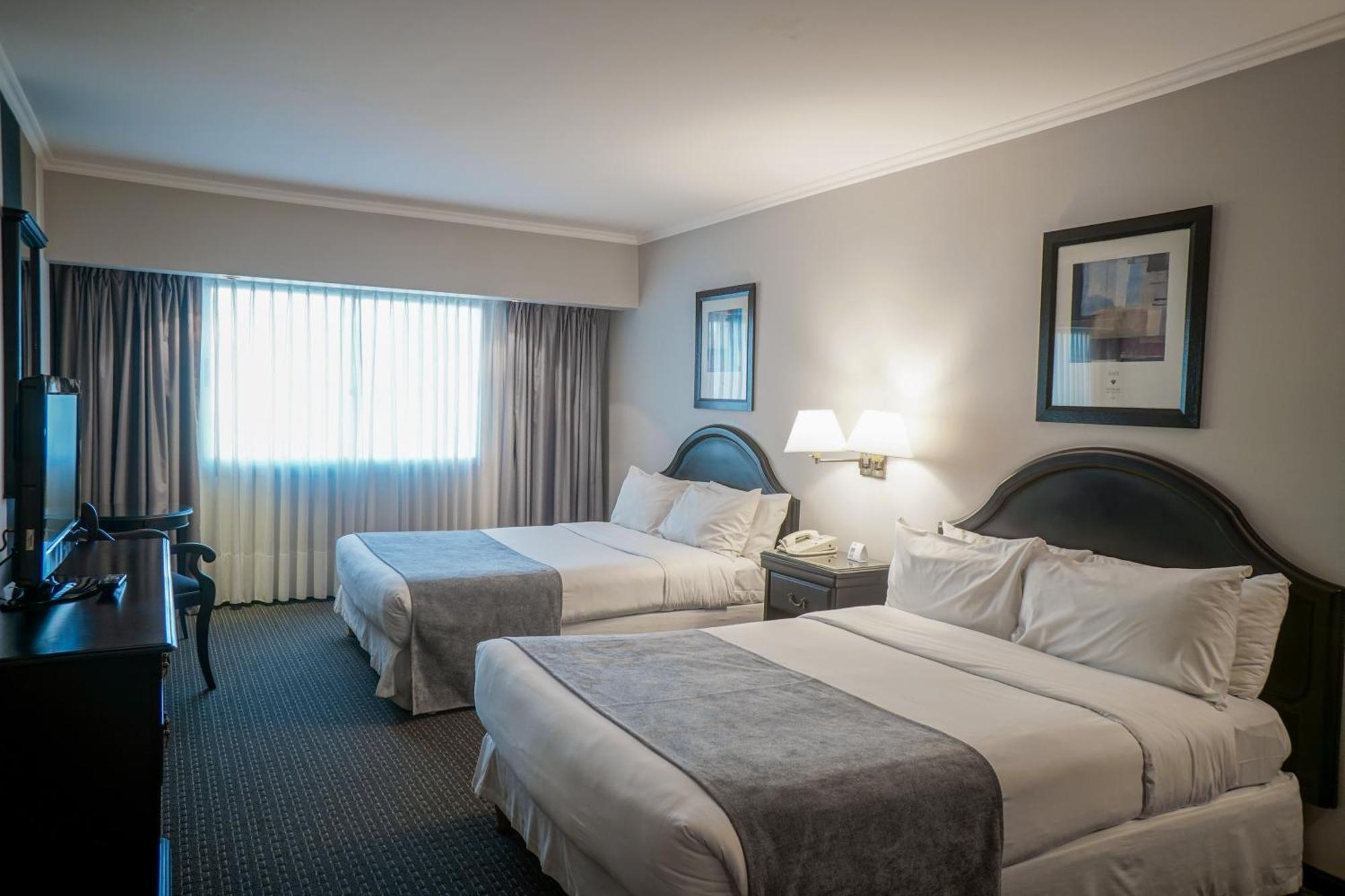Plaza Real Suites Hotel ロサリオ エクステリア 写真