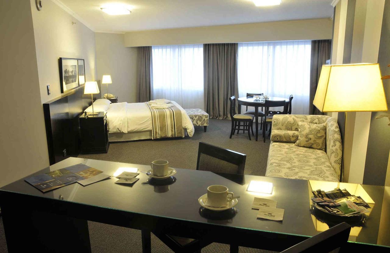 Plaza Real Suites Hotel ロサリオ エクステリア 写真